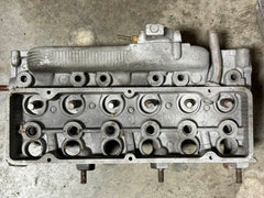 USED 1965-66 CORVAIR TURBOCHARGED ENGINE CYLINDER HEAD 180 HP