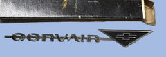 NOS 1963 CORVAIR FRONT EMBLEM "CORVAIR" WITH BLACK TRIANGLE