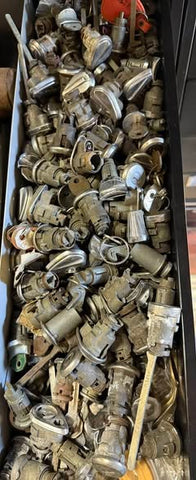Used 1960-64 CORVAIR TRUNK LOCK HOUSING WITH COVER -