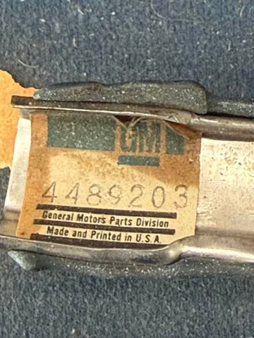 NOS GM 4489203 – Windshield Upper Trim (Right) – 1965–69 Corvair Coupe