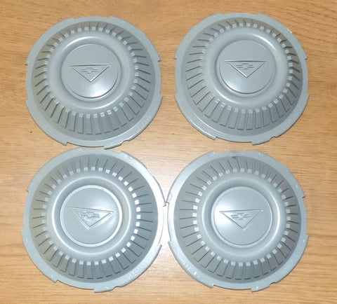 NOS 1964 CORVAIR HUBCAP INSERTS -